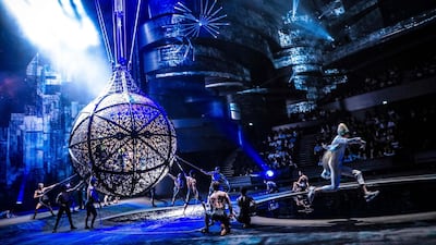 Motorcyclists defy gravity during an act in 'La Perle'. Courtesy La Perle