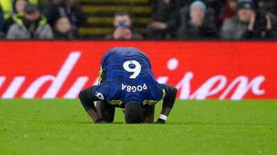 Manchester United's Paul Pogba celebrates after scoring his side's opening goal during the Premier League game against Burnley at Turf Moor in February 2022. AP