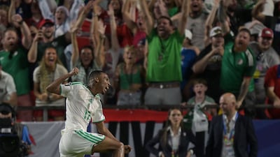 Algeria's Rafik Belghali celebrates scoring against Austria during their 3-3 draw. AFP