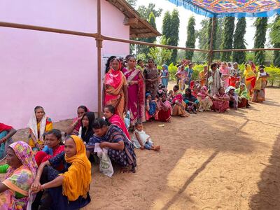 People queue to vote in state assembly elections in Kondagaon, Chhattisgarh state, India. AP
