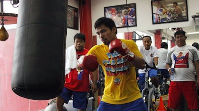 Manny Pacquiao trains on Thursday for his fight in November against Chris Algieri. AFP Photo / September 18, 2014
