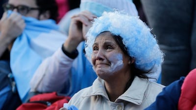 Argentine fans react in disbelief at the end of a televised broadcast of the Croatia v Argentina World Cup match, in Buenos Aires. Jorge Saenz / AP Photo