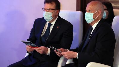 Tunisian President Kais Saied and Telnet CEO Mohamed Frikha attend the launch of Tunisia's first satellite ''Challenge-1''. EPA