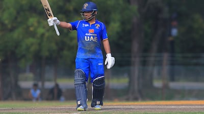 UAE's Rahul Chopra celebrates reaching his half-century