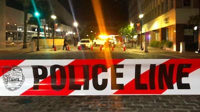 Police tape blocks a street leading to the Jacksonville Landing area in central Jacksonville. AFP