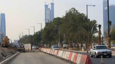 Road expansion works in progress on 32nd Street in Abu Dhabi. Infrastructure spending will boost the capital's economy. Ravindranath K / The National