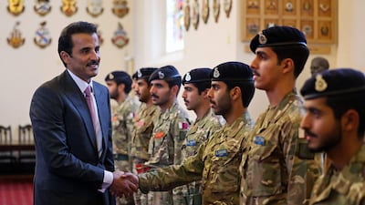 Qatar's Emir Sheikh Tamim meets Qatari cadets during a visit to the Royal Military Academy Sandhurst, south-west of London. AFP