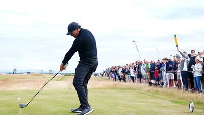 Phil Mickelson tees off at the fourth hole. The American shot an even-par round of 72. PA