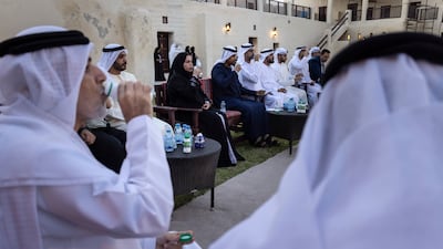 Emirati families and non-Muslim residents break their fasts together with dates, laban and water