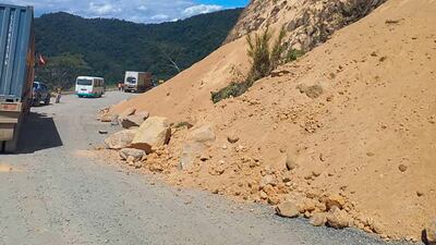 Debris lies strewn across a highway following a landslide near the town of Kainantu, following the quake.