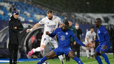Chelsea's Antonio Rudiger challenges Real Madrid's Karim Benzema. AFP