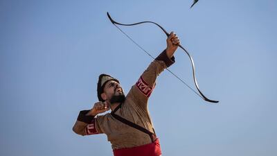 Mahmoud Qalyoubi, founder and head coach at Mamluk Academy UAE, releases a bow in the long-distance shooting event