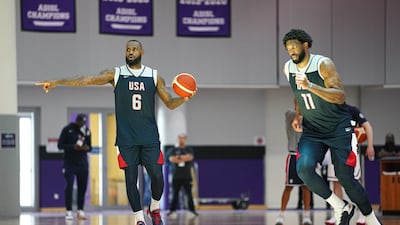 LeBron James and Joel Embiid during practice.