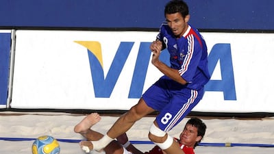 France’s Stephane Francois (8) challenges Uruguay’s Pampero for the ball during their Fifa Beach Soccer World Cup 2008 match in Marseille in 2008. Philippe Laurenson / Reuters