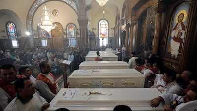 Mourners gather for the funeral of Coptic Christians who were killed in the attack at the Prince Tadros Church. Reuters
