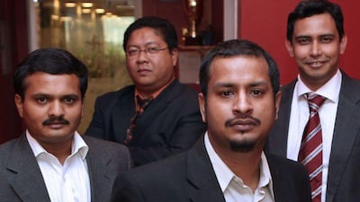 Maddy Reddy, chief executive of Content Syndicate, with his staff Venkat Amirisetty, Jonathan De Guzman and Chetan Cariappa at their office in Dubai.