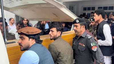 A shooting victim's body is taken from a hospital in Kurram. AFP