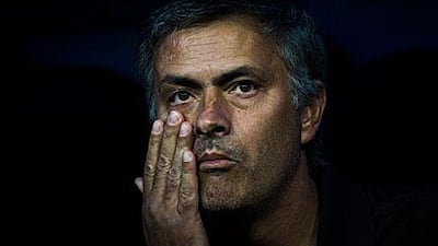 Jose Mourinho, the Real Madrid coach, poked Tito Vilanova in the eye during his side's defeat to Barcelona on Wednesday.