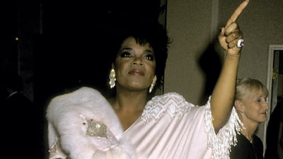Oprah Winfrey wears a white fringed gown and fur shawl to attend the 43rd Annual Golden Globe Awards on January 24, 1986 at the Beverly Hilton Hotel in Beverly Hills, California. Getty Images