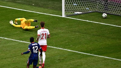 Poland's goalkeeper Wojciech Szczesny can't keep out the winning goal. AFP