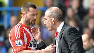 Phil Bardsley, left, was dropped for the final game of the 2012/13 season for a breach of discipline and looks to be in trouble with manager Paolo Di Canio, right, again following comments on social media. Darren Walsh / AP Photo