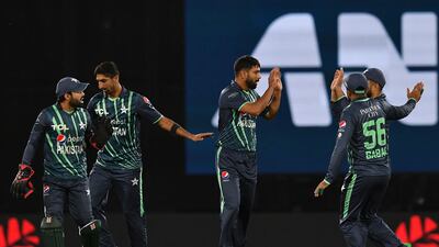 Pakistan's Haris Rauf, centre, picked up three wickets. AFP