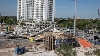 "After the whole thing broke, I was freaking out," one witness said. "I got out of my car and me and a few other people were sprinting over there. We started helping people whose cars were at least half crushed and whoever was easily saved." Cristobal Herrera / EPA