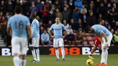 Martin Demichelis has been singled out for criticism among the Manchester City defenders, but continues to get chances on the field. David Klein / AP Photo