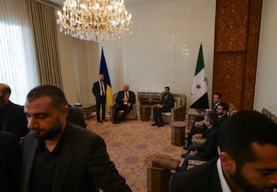 Syria's de facto leader Ahmad Al Shara and Foreign Minister Asaad Hassan Al Shibani meet a Ukrainian delegation in Damascus. Reuters