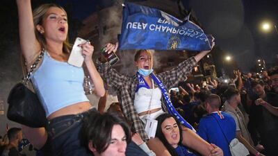 Chelsea supporters celebrate in streets surrounding their Stamford Bridge stadium in London their Champions League victory. AFP