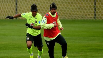 Fred, right, and Paulinho take part in Brazil's training session at the squad's Granja Comary training complex on July 11, 2014, in Teresopolis, 90 km from downtown Rio de Janeiro, Brazil. Buda Mendes / Getty Images