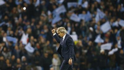 Manchester City manager Manuel Pellegrini celebrates after the game. Reuters / Darren Staples