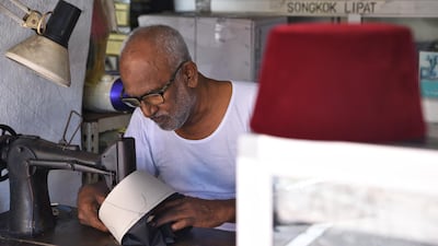 Haja Mohideen, 72, has been handcrafting songkoks in Malaysia for 60 years. Courtesy Ronan O’Connell