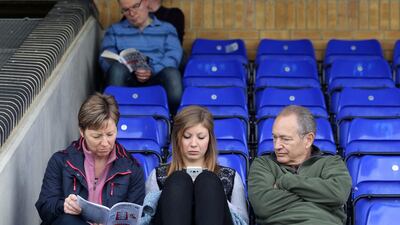 Fans before shown before the FA Cup qualifying match between Stansted and Tilbury at The ProKit Stadium in Bishop's Stortford, England on Sunday. Harry Hubbard / Getty Images
