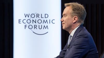 Borge Brende, President of the World Economic Forum (WEF), listens to Indian Prime Minister Narendra Modi and Klaus Schwab, Founder and Executive Chairman of the World Economic Forum (WEF), displayed in screens during the Davos Agenda 2022, in Cologny near Geneva, Switzerland, Monday, Jan. 17, 2022. The Davos Agenda, which takes place from Jan. 17 to Jan. 21, 2022, is an online edition of the annual Davos meeting of the World Economy Forum due to the coronavirus pandemic. (Salvatore di Nolfi / Keystone via AP)