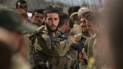Israeli soldiers wait for a meeting with Israeli Minister of Defence Yoav Gallant in Sderot. Getty Images