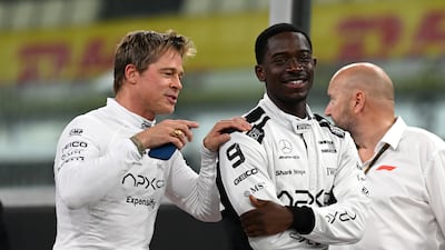 A light-hearted moment between Pitt and F1 co-star Damson Idris at Yas Marina Circuit. Getty Images