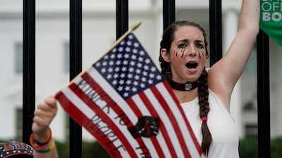 A demonstrator shouts outside the White House during a Women's March protest in the wake of the US Supreme Court overturning Roe v Wade. Reuters
