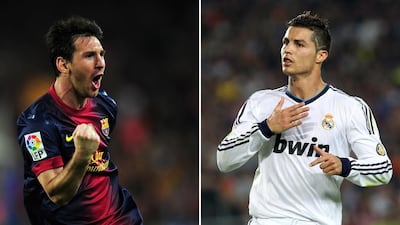 Barcelona's Lionel Messi, left, and Real Madrid's Cristiano Ronaldo. AFP PHOTO/ LLUIS GENE/ QUIQUE GARCIA