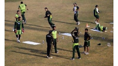 Pakistani cricket players take part in a practice session in Lahore, Pakistan, on Wednesday.