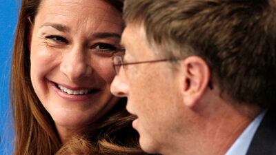 Melinda Gates smiles at her husband Bill Gates during the opening news conference for AIDS 2006, the XVI International AIDS conference in Toronto, August 13, 2006. Reuters