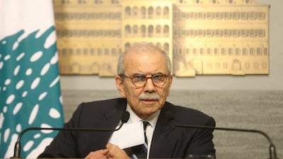 Lebanese Prime Minister Nawaf Salam announces the draft law. Lebanese Government Press Office / AFP