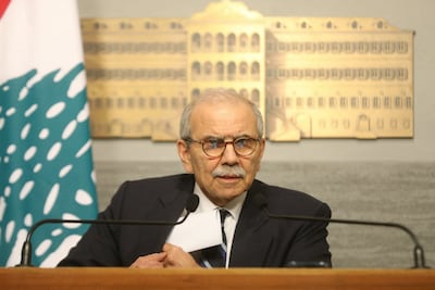 Lebanese Prime Minister Nawaf Salam announces the draft banking law. Lebanese Government Press Office / AFP
