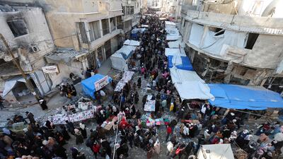 Palestinians shop as they prepare for the upcoming holy fasting month of Ramadan, amid a ceasefire between Israel and Hamas, in Khan Younis, in the southern Gaza Strip, February 27, 2025. REUTERS / Ramadan Abed TPX IMAGES OF THE DAY
