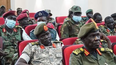 Members of South Sudan's armed forces attend a joint security meeting in the capital Juba last month to help de-escalate tensions in the country. AFP