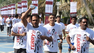 People take part in the Terry Fox run on along Abu Dhabi Corniche. Delores Johnson / The National