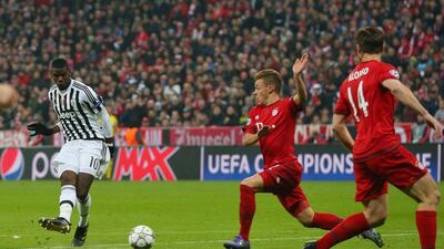 Paul Pogba of Juventus scores his team’s first goal during the Uefa Champions League round of 16, second Leg match between FC Bayern Munich and Juventus at the Allianz Arena on March 16, 2016 in Munich, Germany. (Photo by Alexander Hassenstein/Bongarts/Getty Images)