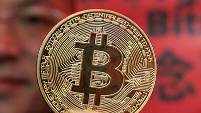 There are calls in the US for more regulation over cryptocurrency such as Bitcoin. Alex Hofford/EPA