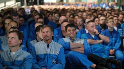 BMW workers listen as German President Frank-Walter Steinmeier speaks to them at the BMW factory. Harald Krueger became chief executive of the German carmaker in May 2015. Getty