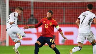 Timo Werner and Sergio Ramos compete for the ball. EPA